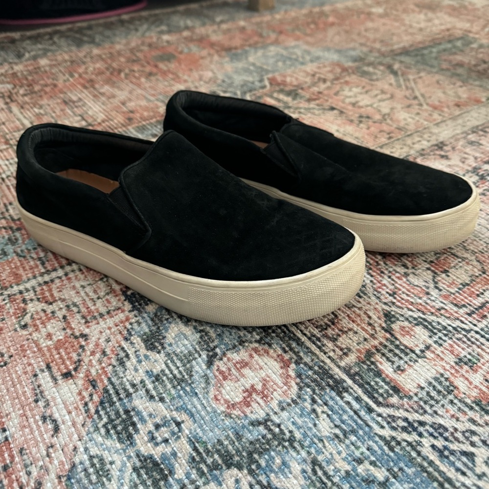 Steve Madden black slip ons